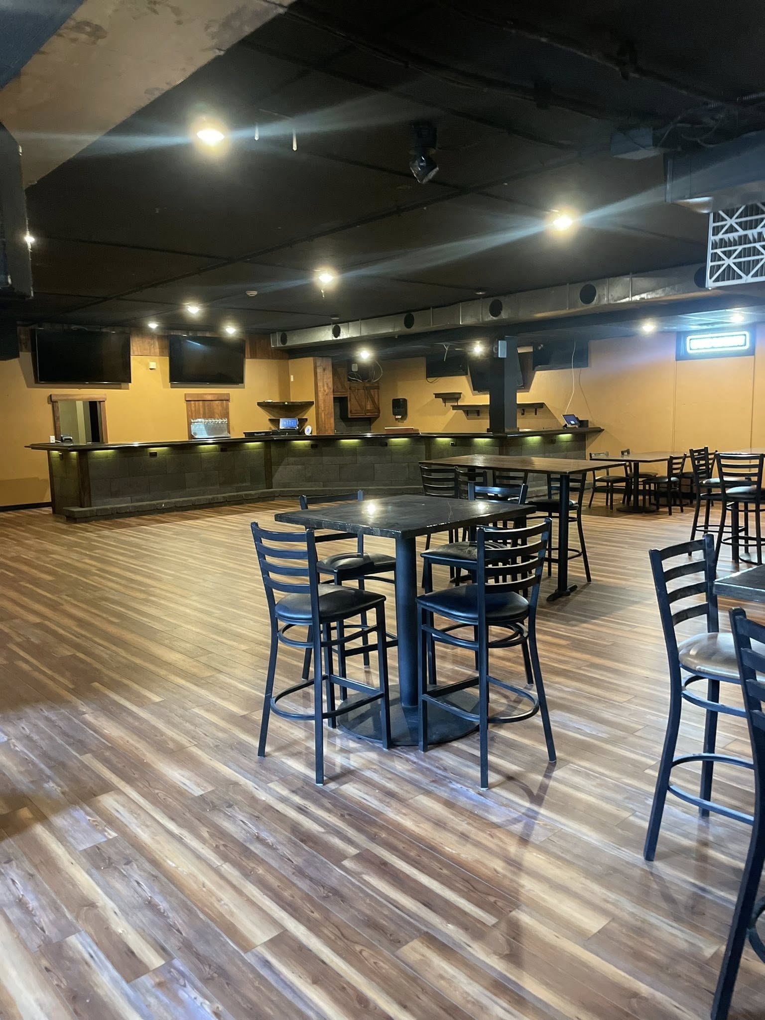The full bar downstairs at Honky Tonk Troy