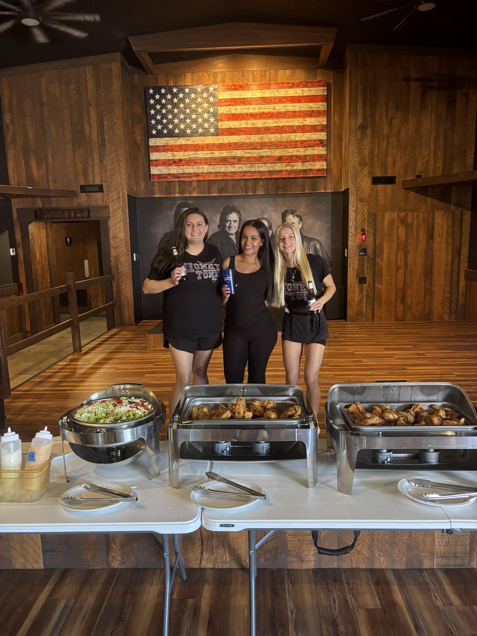 Sunday morning buffet team under the wood-burned flag